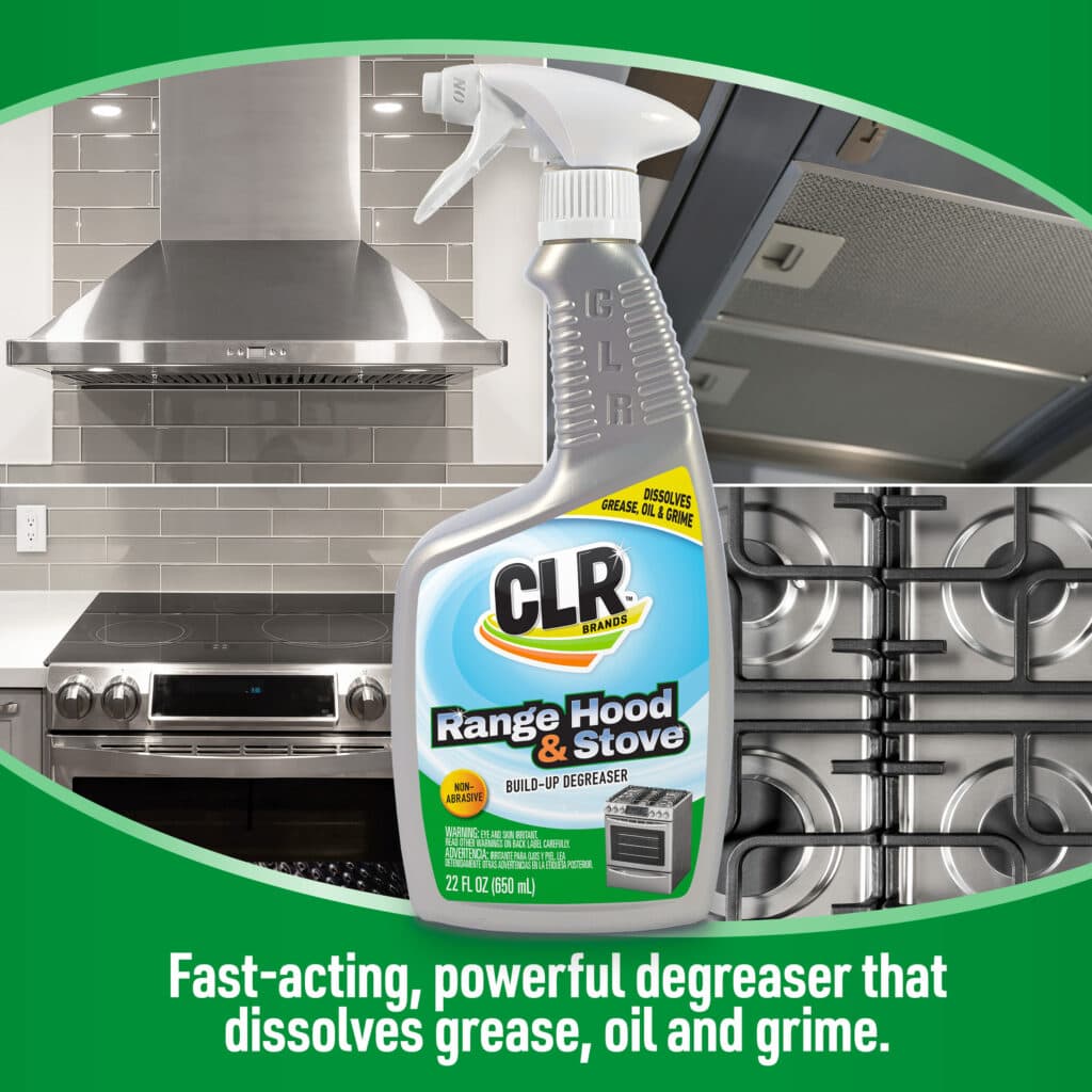 CLR Degreaser bottle near clean kitchen appliances; label: fast-acting, dissolves grease and grime.