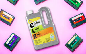 CLR remover bottle on pink background, surrounded by colorful cassette tapes.