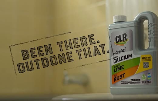 CLR Calcium, Lime & Rust remover bottle on bathroom surface with "Been there. Outdone that." in bold text.